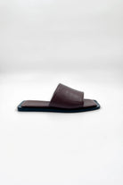 Lenny Sandals displayed in both suede and leather options, showcasing their luxurious materials and classic design.