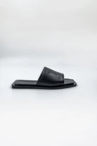 Lenny Sandals displayed in both suede and leather options, showcasing their luxurious materials and classic design.