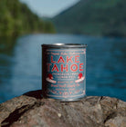 Lake Tahoe Candle: Handcrafted organic soy wax candle emitting a serene glow, epitome of natural tranquility.