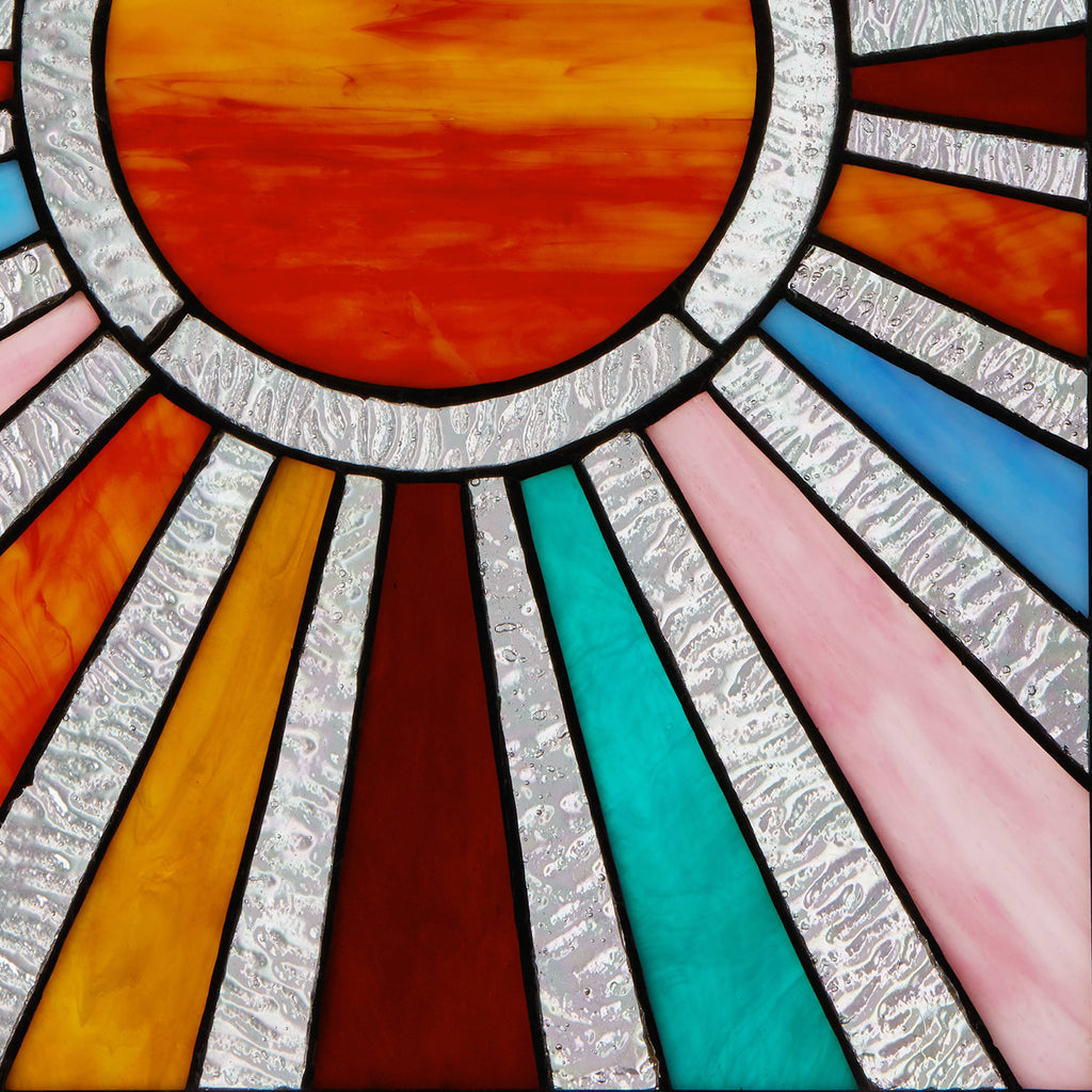 Sunburst Stained Glass Mosaic - Expertly handcrafted mosaic capturing the brilliance of a sunburst in vibrant hues.