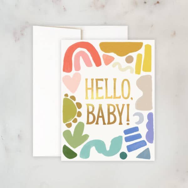 Greeting card with abstract colorful shapes and the phrase “Hello, Baby!” in gold lettering.