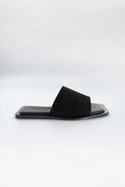 Lenny Sandals displayed in both suede and leather options, showcasing their luxurious materials and classic design.