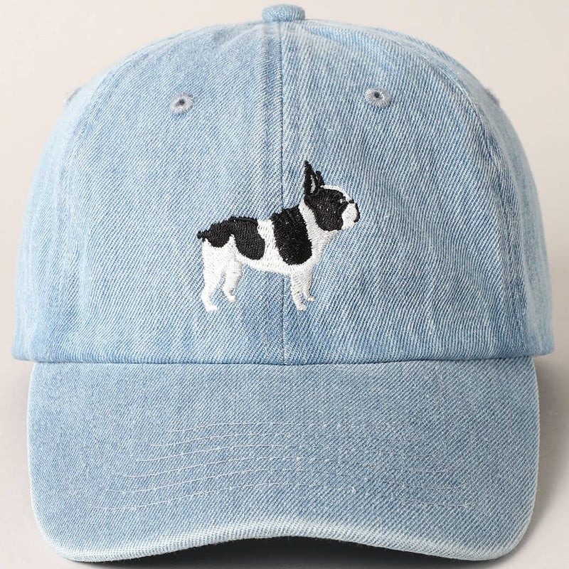 Light-wash denim baseball cap with embroidered black and white French Bulldog design.