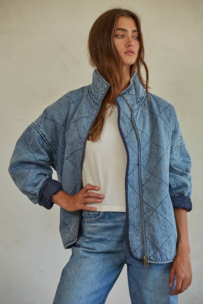 A denim jacket with a serene, minimalist design.
