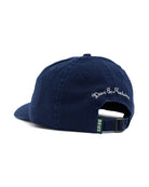 Navy blue cap with ' Deus Ex Machina' logo on a white background