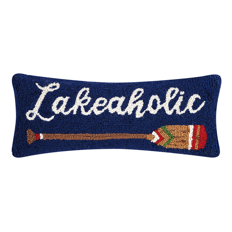 Lakeaholic hook pillow with a deep blue background, white "Lakeaholic" script, and a colorful paddle graphic.