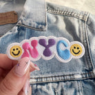 NYC Smiley Patch featuring a cheerful smiley face with the NYC skyline.