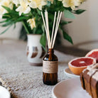P.F. Candle Sweet Grapefruit Diffuser - A carefully crafted diffuser with the invigorating scent of sweet grapefruit.