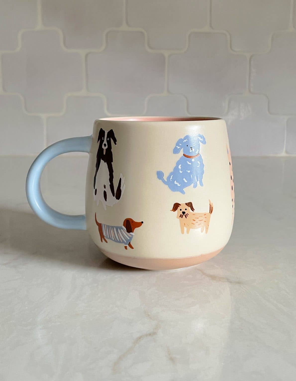 FORMA Ceramic Dogs Mug - Quirky canine charm for delightful sips.