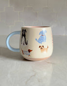 FORMA Ceramic Dogs Mug - Quirky canine charm for delightful sips.