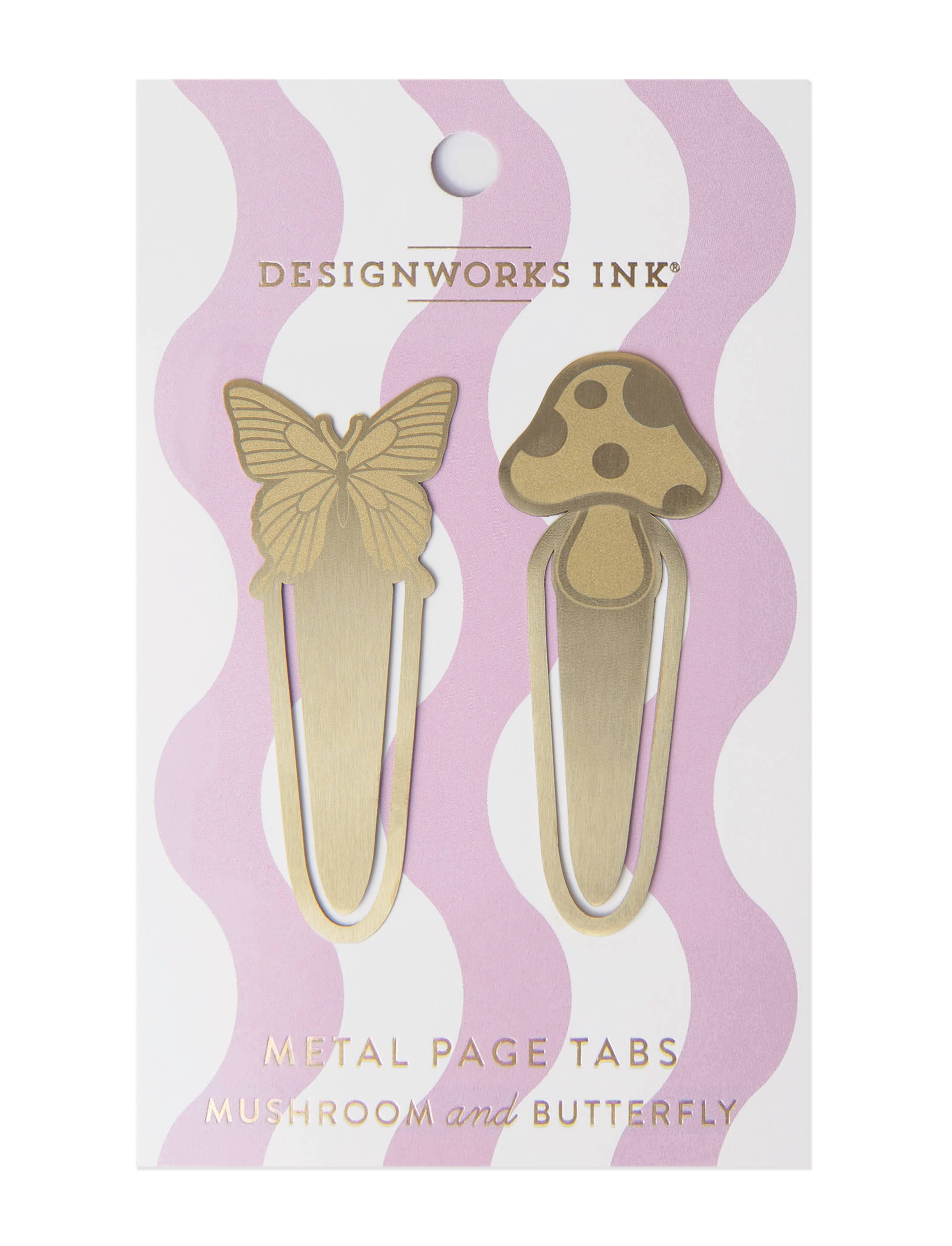 A set of two brass metal page tabs in butterfly and mushroom shapes, packaged on a pastel pink and white wavy background.