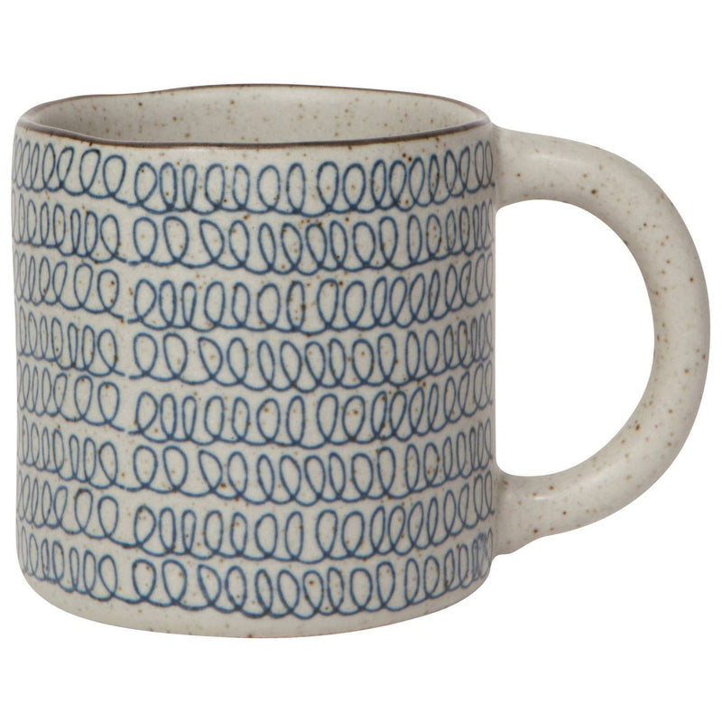Handmade ceramic mug with a speckled glaze and blue loop pattern, featuring a sturdy handle for coffee or tea.