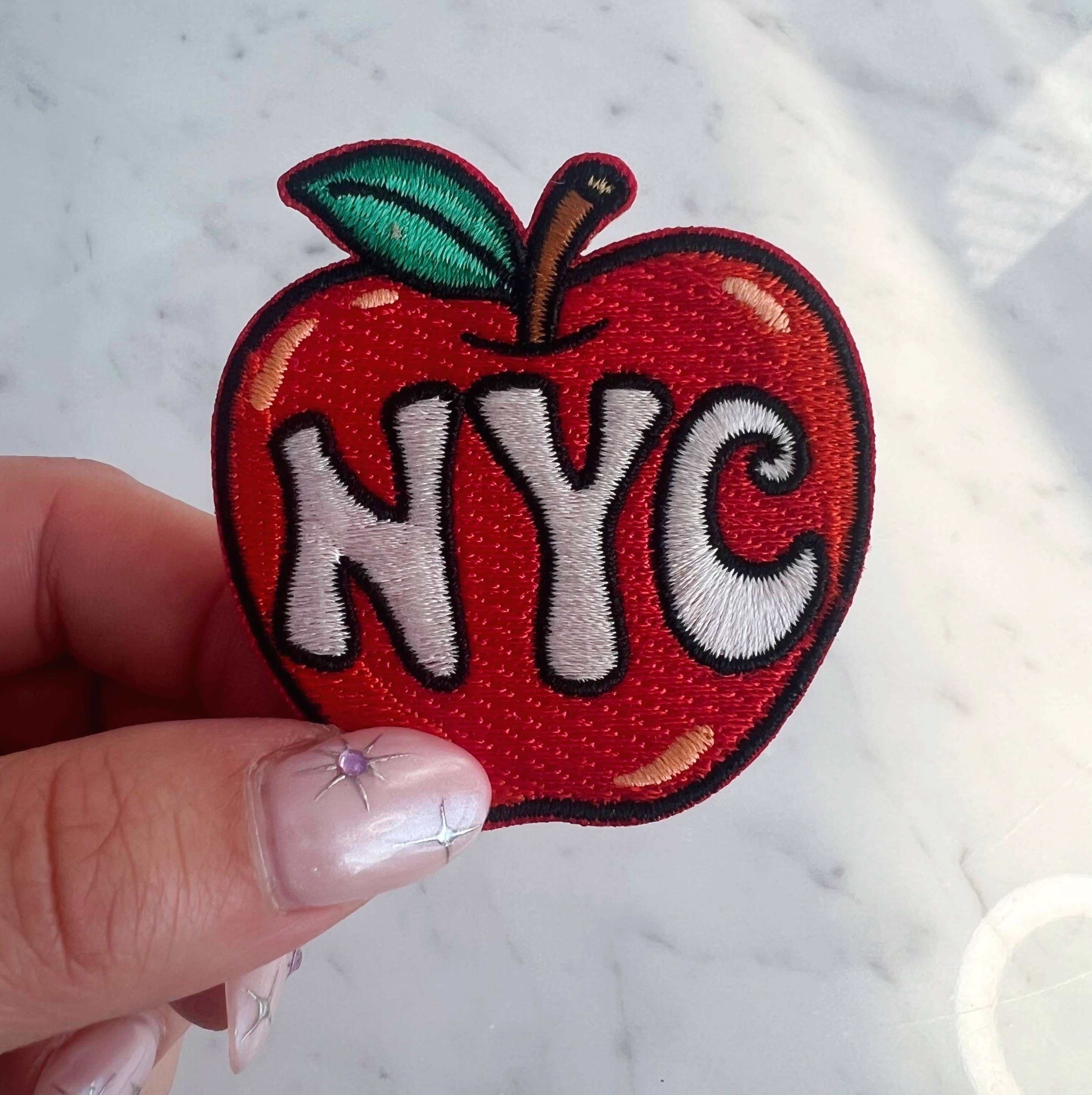 NYC Big Apple Patch featuring a vibrant design of the iconic Big Apple.