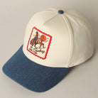 Cap with embroidered design on a beige background