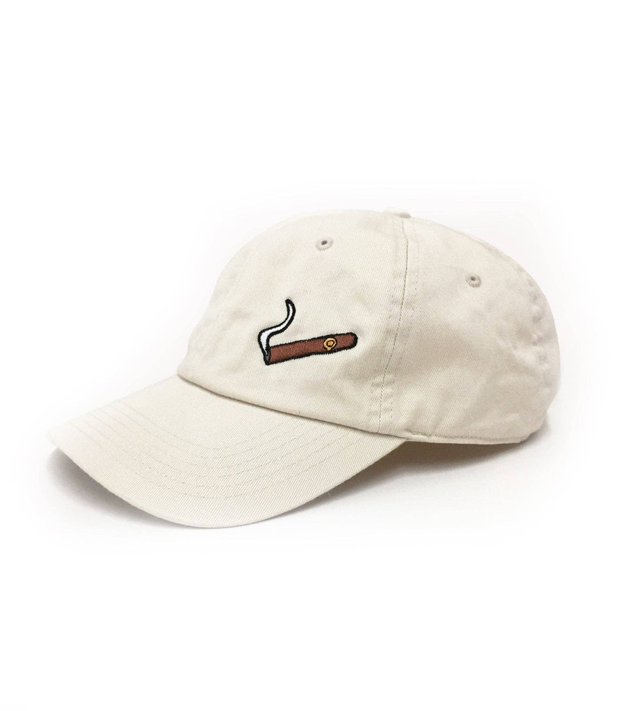 Beige cap with a smoking emoji design on a white background