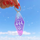 Angel Number Motel Keychain, combining symbolic angel numbers with a nostalgic motel key design.