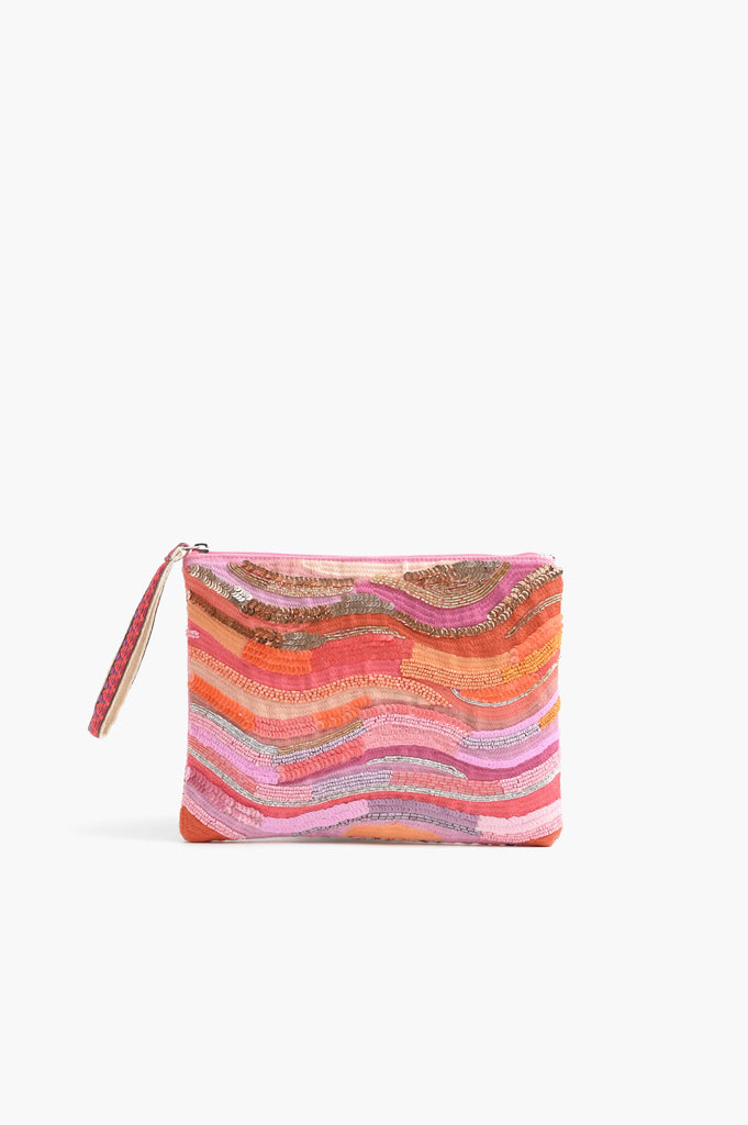 Colorful beaded clutch with wavy sunset-inspired embroidery in pink, orange, and gold tones.