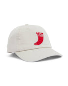 Ivory baseball cap with a red embroidered “DEUS Customs” patch on the front