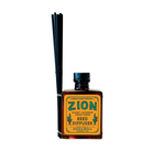 Zion reed diffuser with amber glass bottle and black reeds by Good & Well Supply Co., scented with desert lavender and herbs.