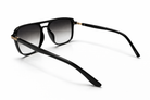 Black sunglasses with gradient lenses on a white background