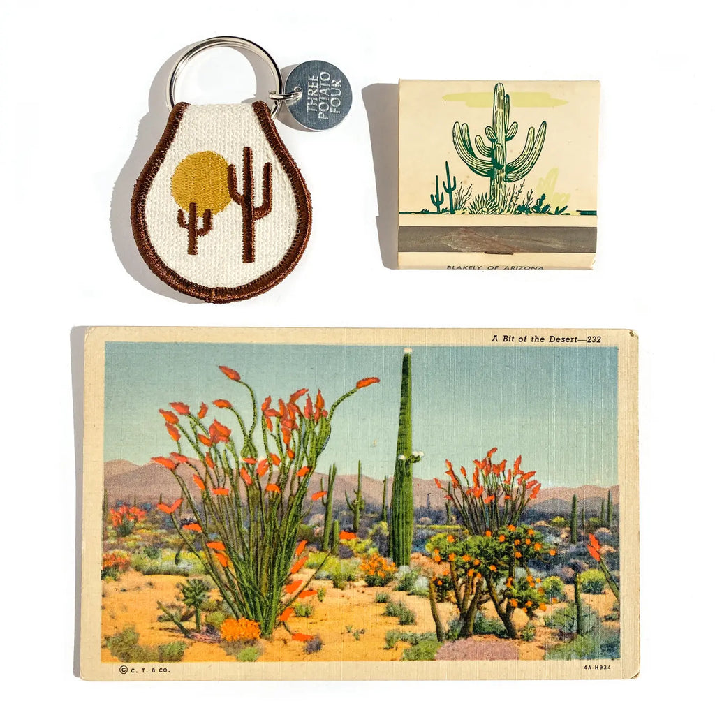 Desert Vibes Patch Keychain - A stylish accessory featuring an intricately designed patch inspired by desert landscapes.