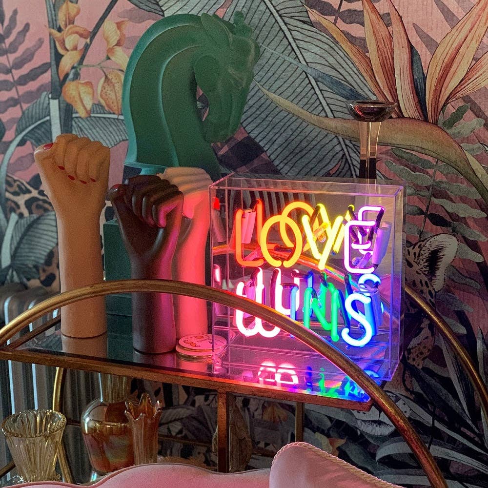 'Love Wins' Neon Light - A bright and inclusive symbol of love and unity.