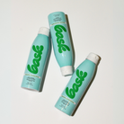 A bottle of Bask SPF 30 Mineral Non-Aerosol Spray with a turquoise label on a white background.