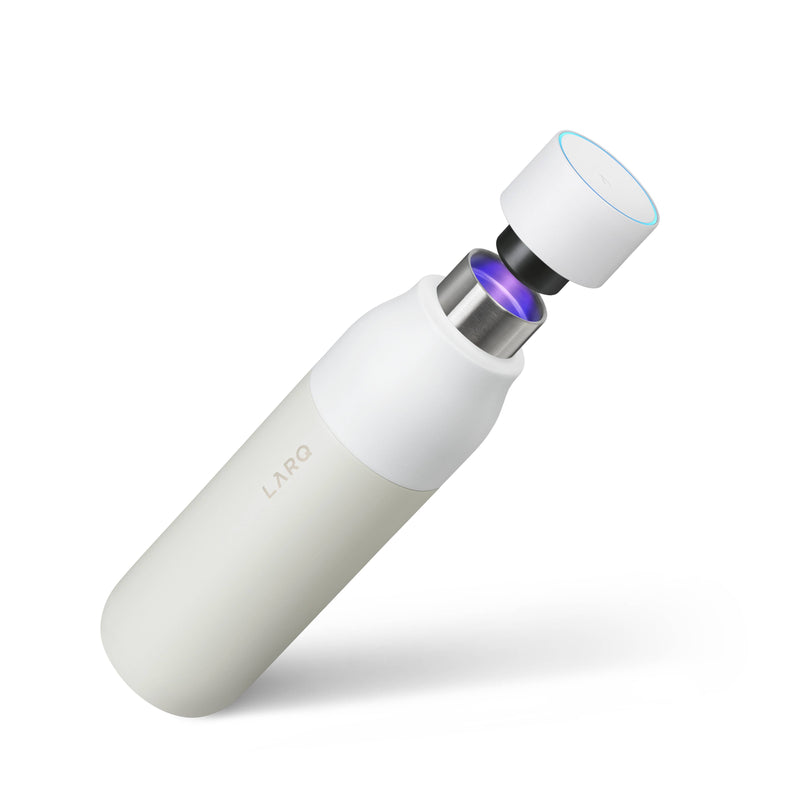 LARQ white water bottle with UV-C LED cap active, floating on a white background.
