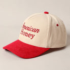 Corduroy trucker baseball cap with "American Honey" embroidered in red on cream and red fabric.