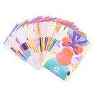 Your Cosmic Year astrology deck in bold orange, pink, and purple packaging with illustrated mirrored faces and celestial elements.