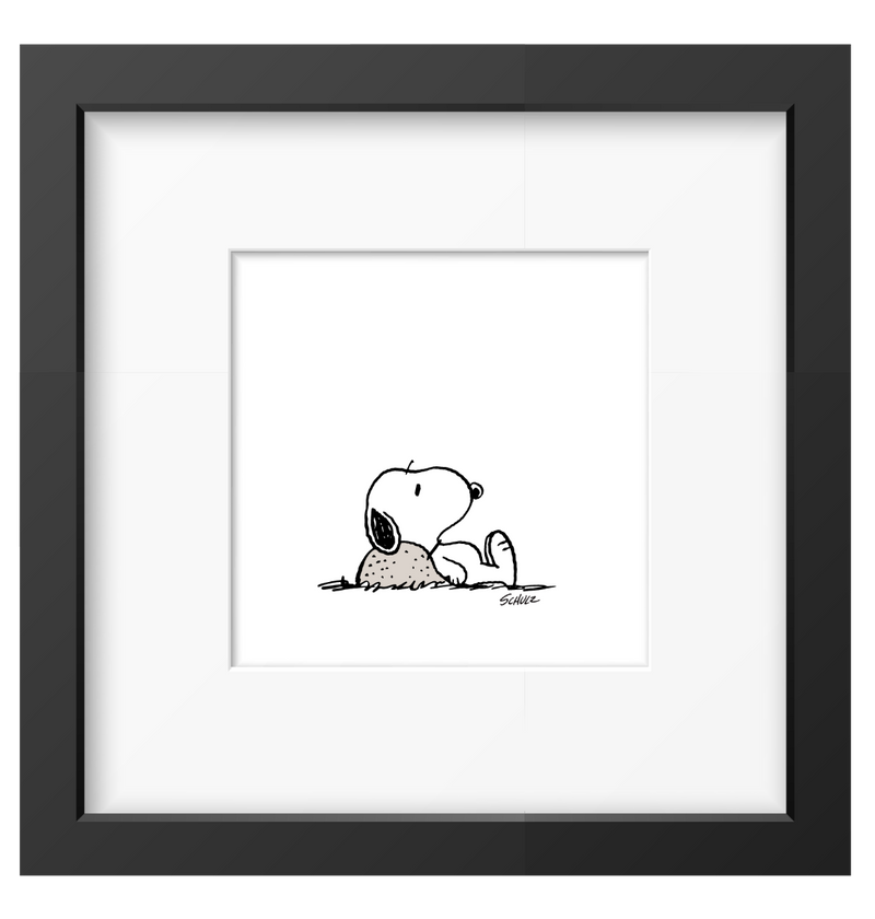 Framed black-and-white print of a relaxed, daydreaming dog, perfect for adding a peaceful and charming touch to any space.
