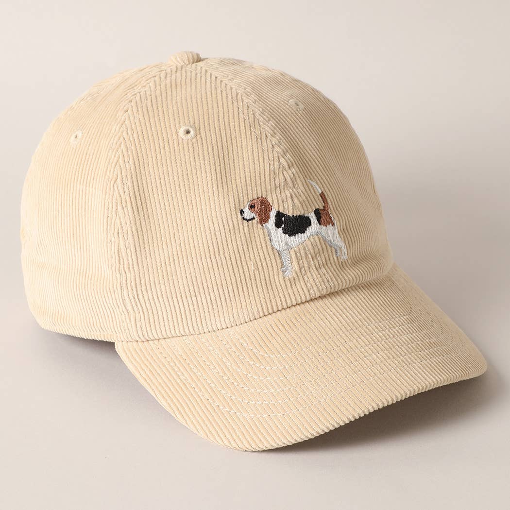 Beige corduroy baseball cap with embroidered beagle dog design on the front.