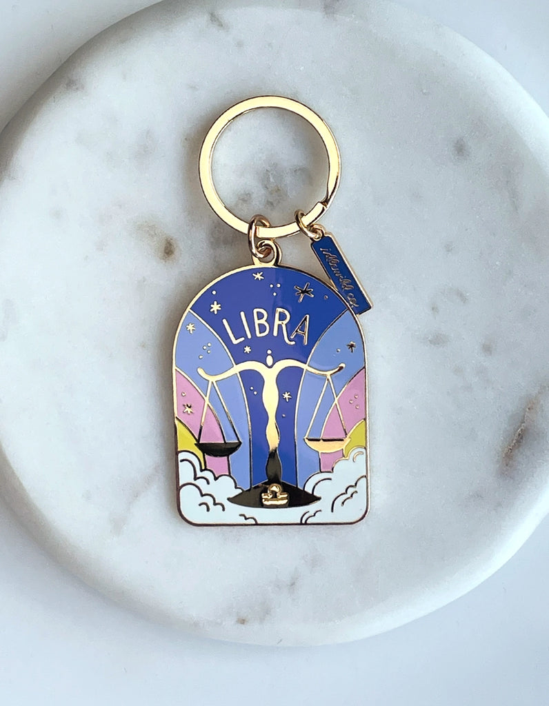 Libra Keychain - Sleek and durable keychain featuring the Libra zodiac symbol.