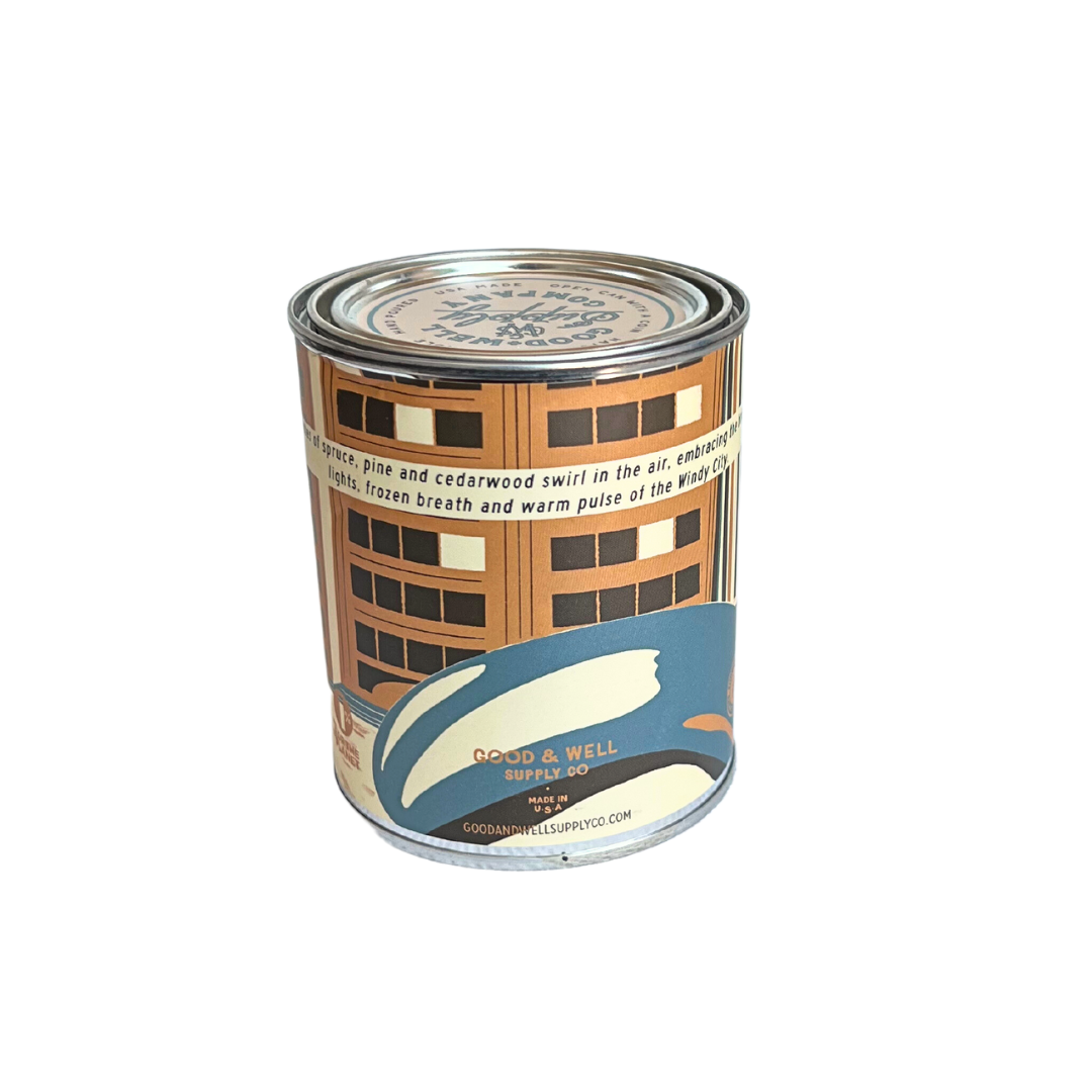 Chicago Candle: A lit candle emanating warmth and comfort, epitome of relaxation.