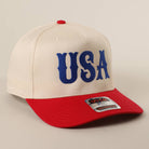 Cap with 'USA' text on a beige background