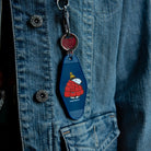 Peanuts Snoopy Puffy Coat Key Tag - Snoopy in a puffy coat, a cute and durable winter-themed key accessory.