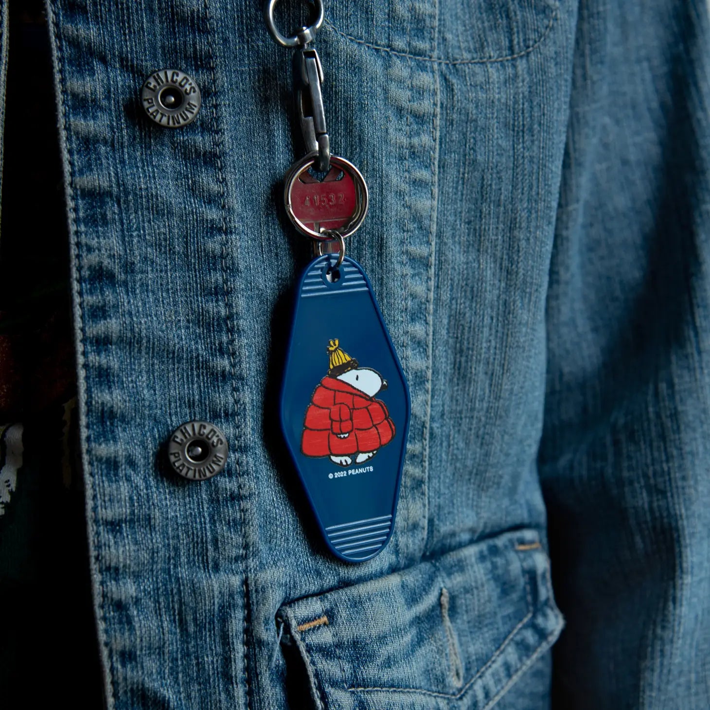 Peanuts Snoopy Puffy Coat Key Tag - Snoopy in a puffy coat, a cute and durable winter-themed key accessory.