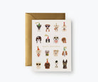 Cute dog-themed birthday card with illustrated pups wearing party hats and sunglasses, paired with a gold envelope.