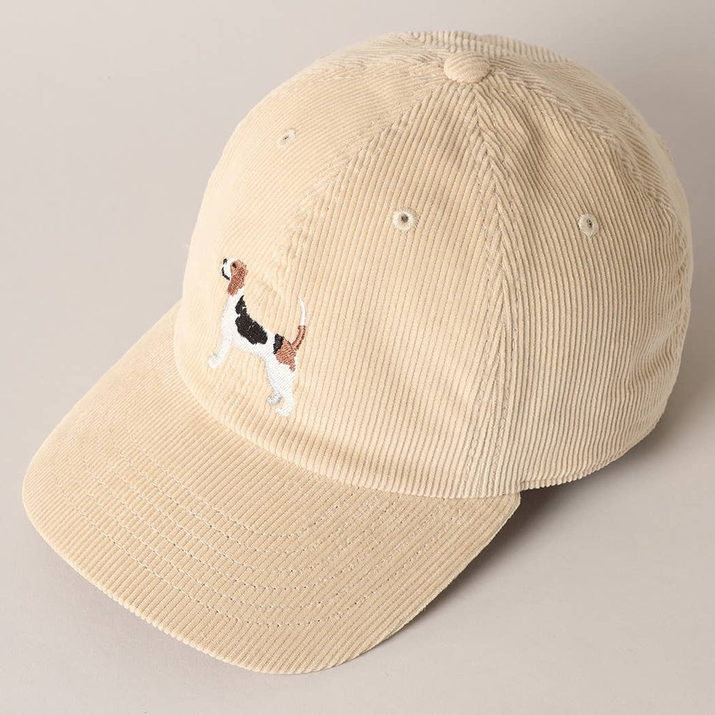 Beige corduroy baseball cap with embroidered beagle dog design on the front.