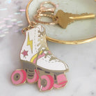 Roller Skate Keychain with a fun roller skate design and star accent.