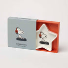 Star-shaped ceramic trinket dish with a DJ wearing headphones and using a turntable, packaged in a blue and orange gift box.