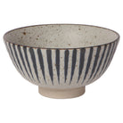 Ceramic bowl with striped pattern on a white background
