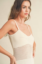 Model wearing the Maren Knitted Dress with delicate straps, mesh waist detail, and open-stitch hem.