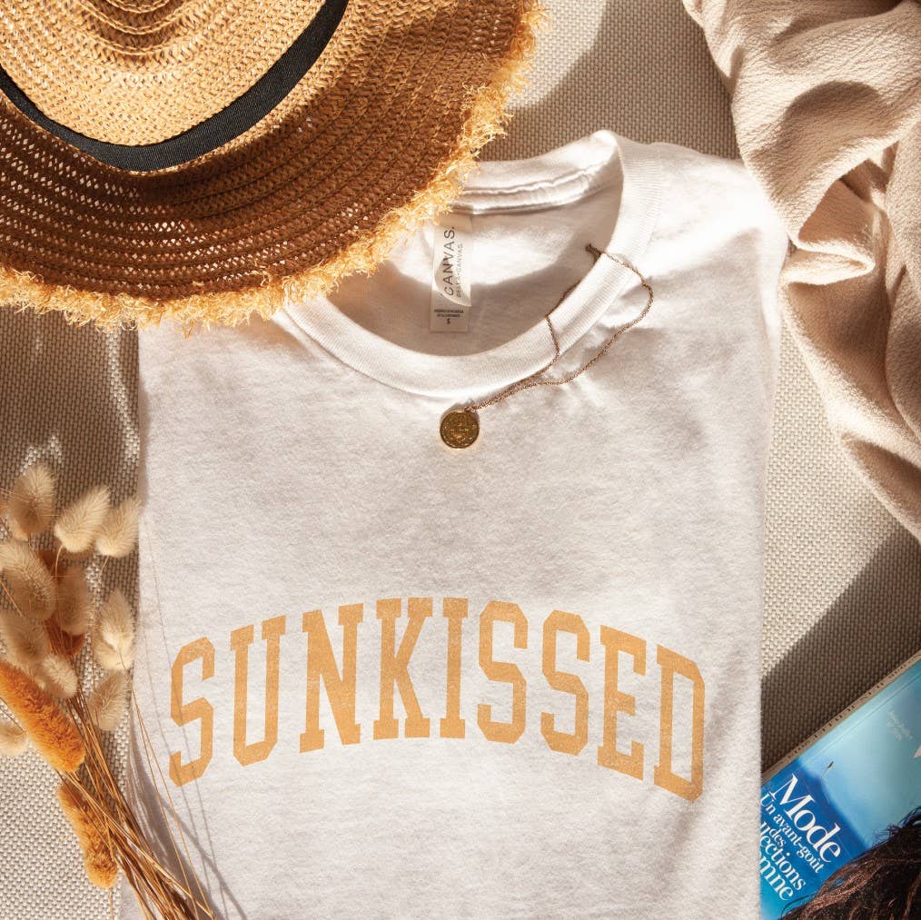 Sunkissed T-Shirt: White shirt with a large sun design.
