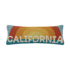 California Sun hook pillow with a retro sunburst design in orange, yellow, and blue, and "California" text in bold white letters.