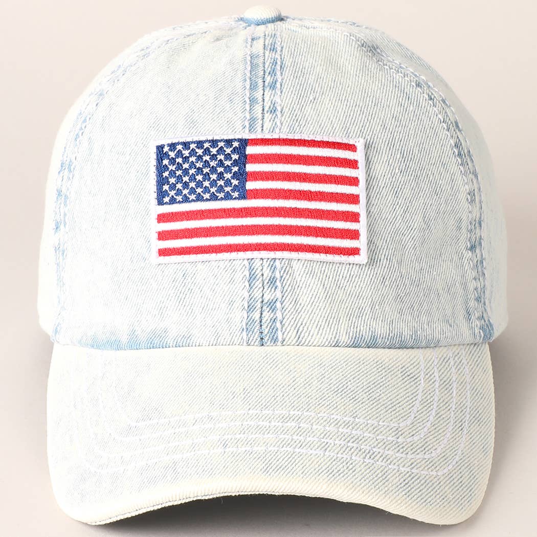 Light-wash denim baseball cap with embroidered American flag patch, ideal for 4th of July.
