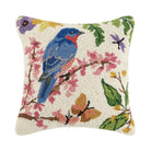 Bluebird hook pillow with a vibrant bird perched on a floral branch, featuring detailed wool embroidery.