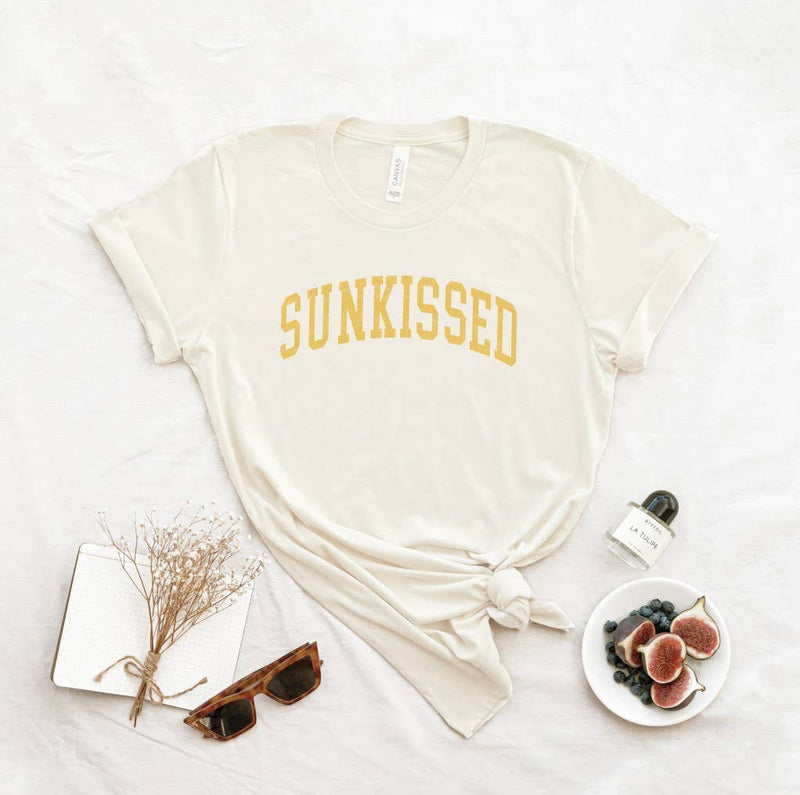 Sunkissed T-Shirt: White shirt with a large sun design.