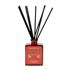 Joshua Tree reed diffuser with amber glass bottle and black reeds by Good & Well Supply Co., scented with lavender, cedar, and sage.