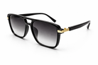 Black sunglasses with gold accents on a white background